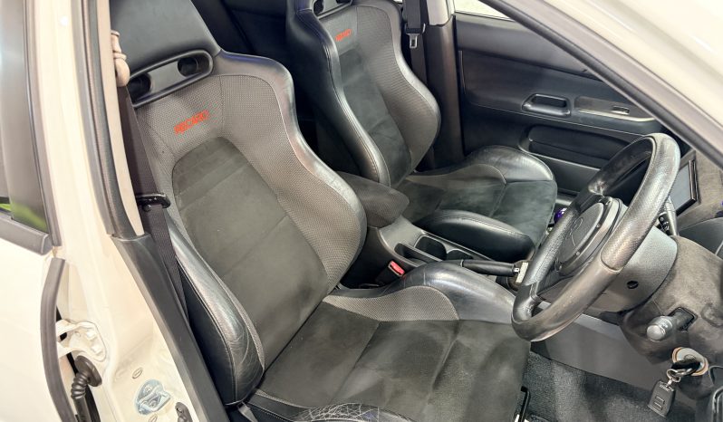
								2005 Mitsubishi Lancer Evolution IX full									