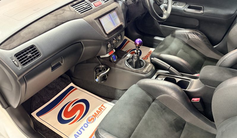 
								2005 Mitsubishi Lancer Evolution IX full									