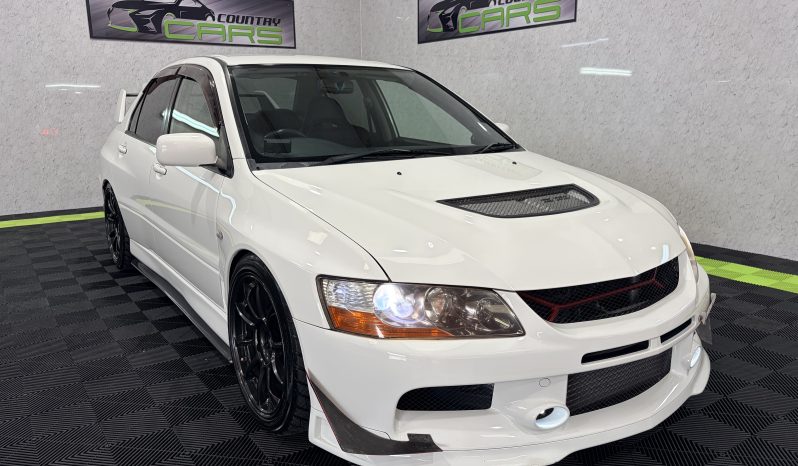 
								2005 Mitsubishi Lancer Evolution IX full									