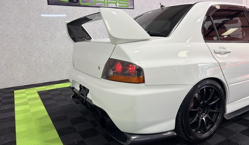 
								2005 Mitsubishi Lancer Evolution IX full									