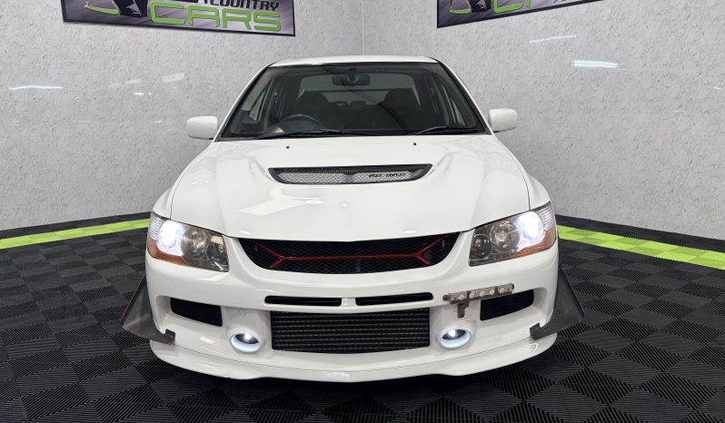 
								2005 Mitsubishi Lancer Evolution IX full									
