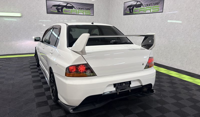 
								2005 Mitsubishi Lancer Evolution IX full									