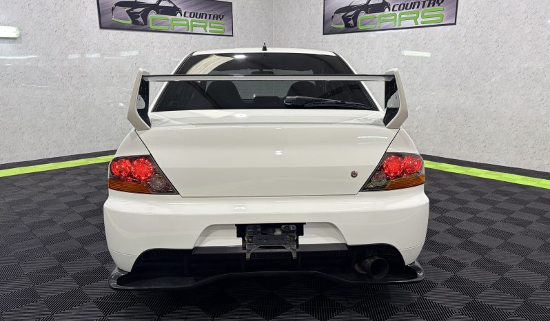 
								2005 Mitsubishi Lancer Evolution IX full									