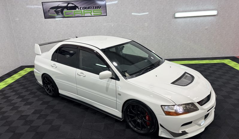 
								2005 Mitsubishi Lancer Evolution IX full									